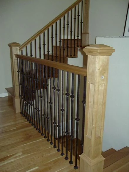 How to Coordinate Wood Stair Handrails With Flooring and Stair Parts